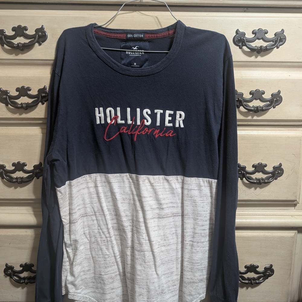 Hollister Navy Long Sleeve Script Logo Tee with Red Accents